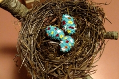 Baby pinecone bird nest