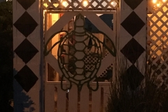 Patio-gate-with-turtle-and-lighthouses