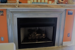 Metal-fireplace-trim-with-Heart-pine-mantel